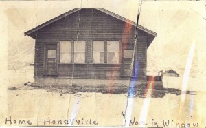 Grant Home in Honeyville, Utah with Nora in window